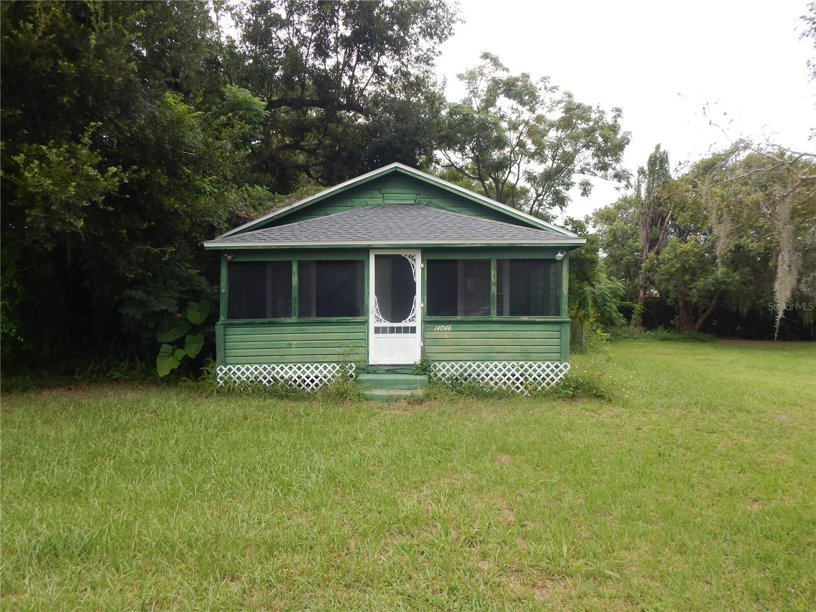 Cozy 2-bedroom 1 bath home located on a spacious .42-acre corner lot located in Dade City. Newer roof, updated kitchen, 1 car carport for covered parking, storage room with laundry hookups. Property has 2 addresses, verify with city on possibilities of building two homes or duplexes. Easy to show!!