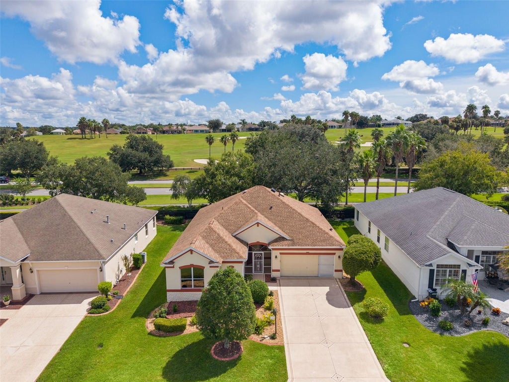 Photo of 1654 Duffy Loop, The Villages, FL 32162 (MLS # G5118138)