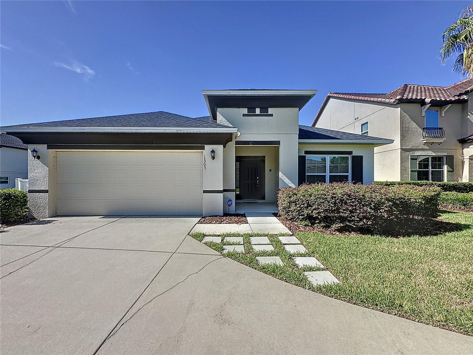 This is it! AFFORDABLE LUXURY, just minutes from Disney awaits at 1303 Yorkshire Court, a beautifully appointed pool/spa home in the prestigious gated community of The Dales at West Haven. Designed with both comfort and elegance in mind, this residence offers the perfect blend of sophistication and practicality for a primary residence, vacation retreat, or short-term rental investment.
From the moment you enter, you’ll notice the quiet luxury of the professionally designed interiors. A soft neutral palette, elegant flooring, and abundant natural light set the tone throughout. The spacious open-concept layout includes four bedrooms and three full bathrooms, centered around a large living, dining, and kitchen area designed for today’s Florida lifestyle. The kitchen serves as the heart of the home with espresso cabinetry, granite counters, formal dining as well as a large island for informal meals, and seamless flow into the light-filled living space overlooking the pool.
The thoughtful split floor plan maximizes both privacy and rental potential. Two bedrooms share a Jack and Jill bath, a third guest bedroom has its own full bath, and the expansive primary suite offers a private retreat with dual vanities, walk-in shower, and generous closet space. This home has been meticulously maintained as a second home and short-term rental, with updates that include stainless steel appliances, granite counters, and a new roof in 2024. A long driveway for multiple vehicles, two-car garage, and only one neighboring property add to the sense of privacy and convenience.
Step outside to a south-facing pool and spa designed for year-round enjoyment. The screened lanai provides ample room for outdoor dining and lounging, complete with a ceiling fan and additional privacy screening. Whether entertaining guests or enjoying a quiet morning coffee, the outdoor space is a true highlight.
As a resident or host, you’ll enjoy access to resort-style amenities, including a clubhouse, pool, gym, tennis courts, and volleyball court. HOA services cover landscaping, gated security, basic cable, and WiFi for a low-maintenance experience. The location is unmatched—just a short drive from Walt Disney World, with easy access to I-4 for trips to Tampa’s Gulf Coast beaches or Orlando’s world-class entertainment. Nearby ChampionsGate, Posner Park Village, and the Omni Resort provide high-end shopping, dining, and golf, while everyday essentials are only minutes away.
Opportunities like this are rare in The Dales at West Haven. Combining affordable luxury, a prime location, and income-producing potential, this home represents the best of Central Florida living. Schedule your showing today and experience the lifestyle for yourself.