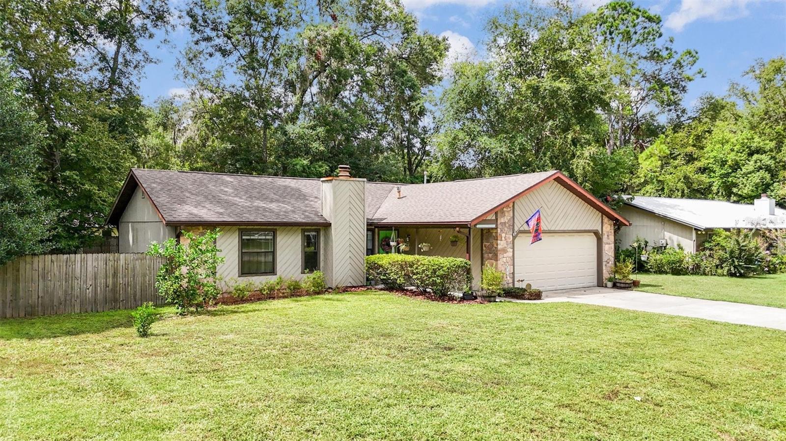 One or more photo(s) has been virtually staged. WELCOME to this inviting 3-bedroom, 2-bath single-family home on a overly sized spacious lot with no HOA in the heart of Gainesville! This well-kept home features a 2019 roof, some beautiful updated floors through out, and a cozy brick gas fireplace that sets the tone for comfortable living. The functional floor plan offers generous living spaces filled with natural light, plus a screened-in porch perfect for enjoying your morning coffee or relaxing in the evenings. the spacious back yard offers plenty of room for outdoor dining, games, gardening, or even adding a pool — the possibilities are endless! Conveniently located just minutes from the University of Florida, Shands Hospital, HCA, shopping, dining, and all of Gainesville’s vibrant amenities. With its prime location, and desirable features, this property is a rare find — call today to schedule your VIP PRIVATE TOUR!