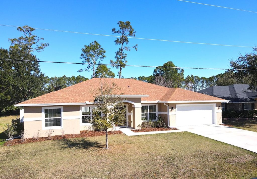 Photo of 9 Raemond Lane, Palm Coast, FL 32164 (MLS # FC316409)
