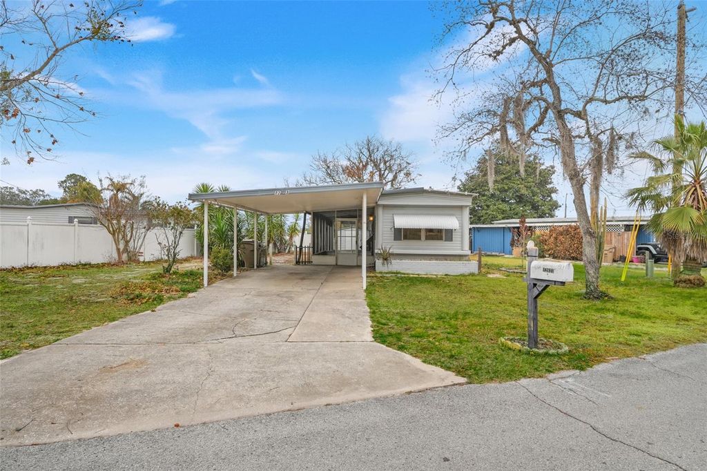 Photo of 12623 Milwaukee Avenue, Tavares, FL 32778 (MLS # G5108149)