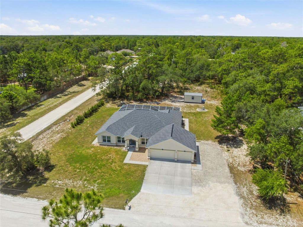 Photo of 11020 Sage Thrasher Avenue, Weeki Wachee, FL 34614 (MLS # TB8521768)