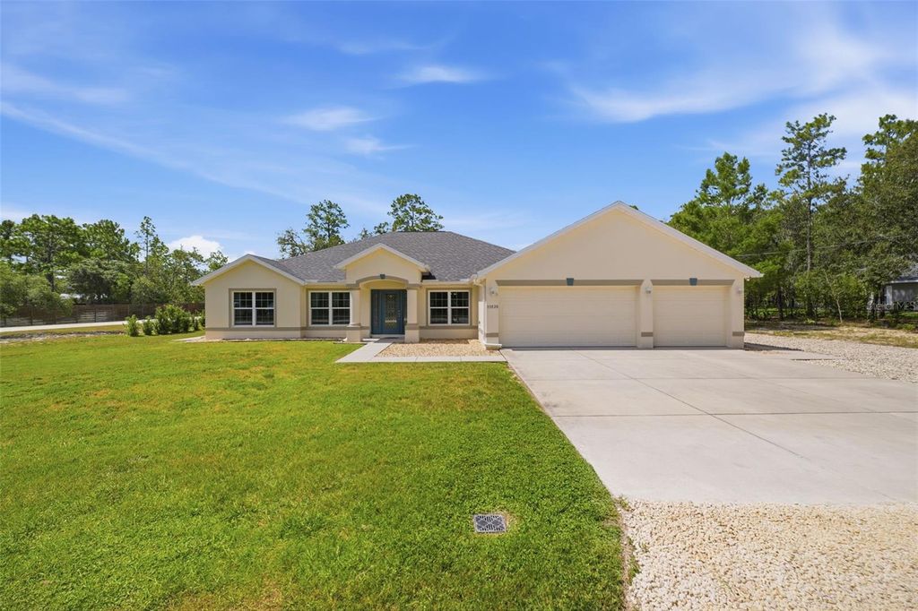 Photo of 11020 Sage Thrasher Avenue, Weeki Wachee, FL 34614 (MLS # TB8521768)