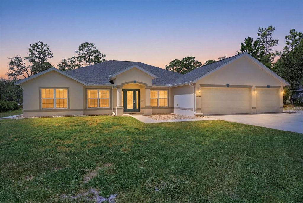 Photo of 11020 Sage Thrasher Avenue, Weeki Wachee, FL 34614 (MLS # TB8521768)