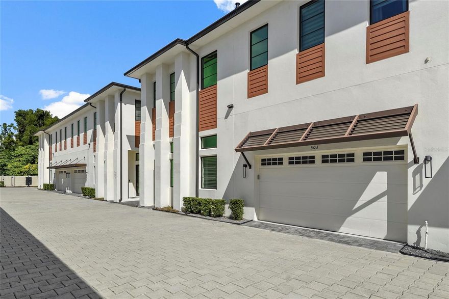 MODEL HOME. Enjoy luxury living and premium sought after location at Vilasa Homes, 2022 construction in Winter Park, FL 32789. Walk to Park Avenue lifestyle, arts and culture, a mini-version of Manhattan’s Central Park, brick streets, historic neighborhoods, area’s hottest restaurants, shopping and the prestigious Rollins College. Modern finishes for this 2-story townhome personally selected by one of the nation’s top interior designers. Handpicked design team of Nasrallah Architectural Group, Ted Maines Interiors and Jordan Builders. Alys Beach inspired incorporating wood accents, architectural stairway, wrought iron and two-story ALL BLOCK construction all steps away from downtown Winter Park. Energy saving features such as Pella double pane windows and extra insulation. Home prewired for surround sound, cameras, alarms system etc. Beautifully appointed- engineered wood flooring throughout, recessed lights, level four wall finishes, 13 foot ceilings on the main floor and 10 foot ceilings upstairs. Chef’s gourmet kitchen is complete with high-end flat panel cabinetry, Quartz countertops, island, Wolf gas cooktop and Subzero appliances overlooking landscaping and greenery. This unit is totally upgraded! Quartz counters and backsplash, tall upper kitchen cabinets and staircase lighting (a $65k value). Spacious master retreat on second floor. Rest in your garden tub and oversized walk in shower, Quartz countertops, designer tile, Koehler fixtures/ bathroom accessories and custom lighting treatments. Two more suites that can be used for exercise, office or bedrooms. Generous closet and storage spaces. 2-car garages featuring insulated steel garage doors. The Canton townhomes each have a backyard measuring approx 40ft x 11ft. with a 28ft x 4ft patio slab which extends from the sliding doors and brand new artificial turf. Convenient and minutes from Hillstone, Whole Foods, Trader Joes, restaurants and premier shopping. Top rated 9 hole Winter Park Golf Course, Casa Feliz, Morse Museum, water sports, Rollins and churches are all short stroll away.