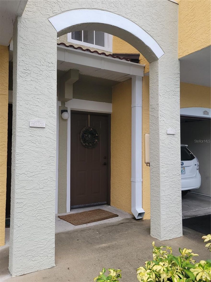 One or more photo(s) has been virtually staged. BACK ON THE MARKET, BUYER FINANCING FELL THROUGH. Looking for a Sarasota Townhome with resort style amenities? Don’t miss this 3 Bedroom, 2 Bath spacious three story home in beautiful Las Palmas near UTC Mall. As you enter Las Palmas via its gated private road you will appreciate its quiet and beautifully maintained mature landscape and Mediterranean influenced architecture. From the ample surface parking and your ground-level 1 car garage, you access via your entry foyer and head upstairs to the second story main living areas. At the top of the stairs as you enter the open kitchen that forms the hub of the home, you'll be captivated by the two story soaring ceilings, encircled by the elevated catwalk that forms the 3rd floor walkway. The soaring open ceiling makes the interior light and bright throughout. The main living area includes the kitchen, dinette, living room with slider to east facing lanai, 2nd bathroom and 3rd bedroom. The kitchen features granite counters, breakfast bar, cooking island, pantry, plus an adjoining dining area. On the 3rd floor you’ll find both the 2nd and primary bedrooms. The primary bedroom with ensuite bath features a large walk-in closet, dual sinks, tub-shower combo, private toilet room and 2nd entry to walkway and laundry room. Recent upgrades include new roof 2024, HVAC 2024, hot water tank 2021. Las Palmas is a gated community with welcoming amenities: two clubhouses with heated pools, two fitness centers, tennis courts that also host pickle ball, and a clubhouse with billiards and an outdoor kitchen which includes electric grills, a car wash station, a dog park, and even extra storage for RVs and large trucks. Las Palmas is conveniently located to the famous UTC MALL provides shopping, dining and entertainment, the new Mote Aquarium is opening October 8th, and don’t miss the fun at Pop Stroke golf! Make this your Florida lifestyle!