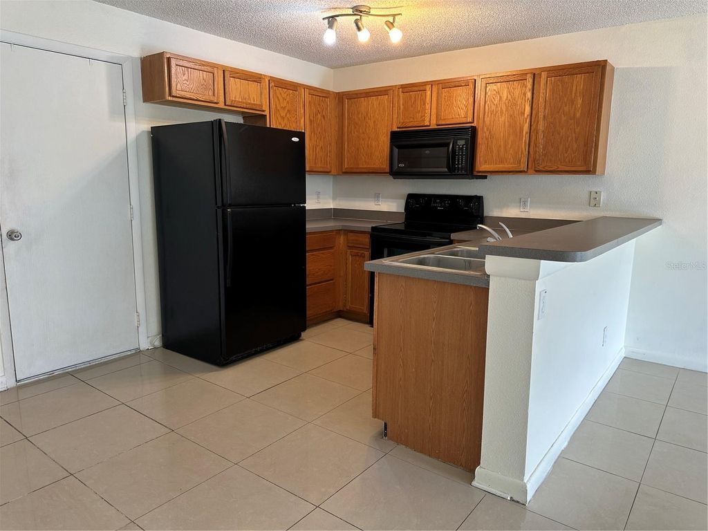 Photo of 12640 Somerset Oaks Street, Orlando, FL 32828 (MLS # O6395956)