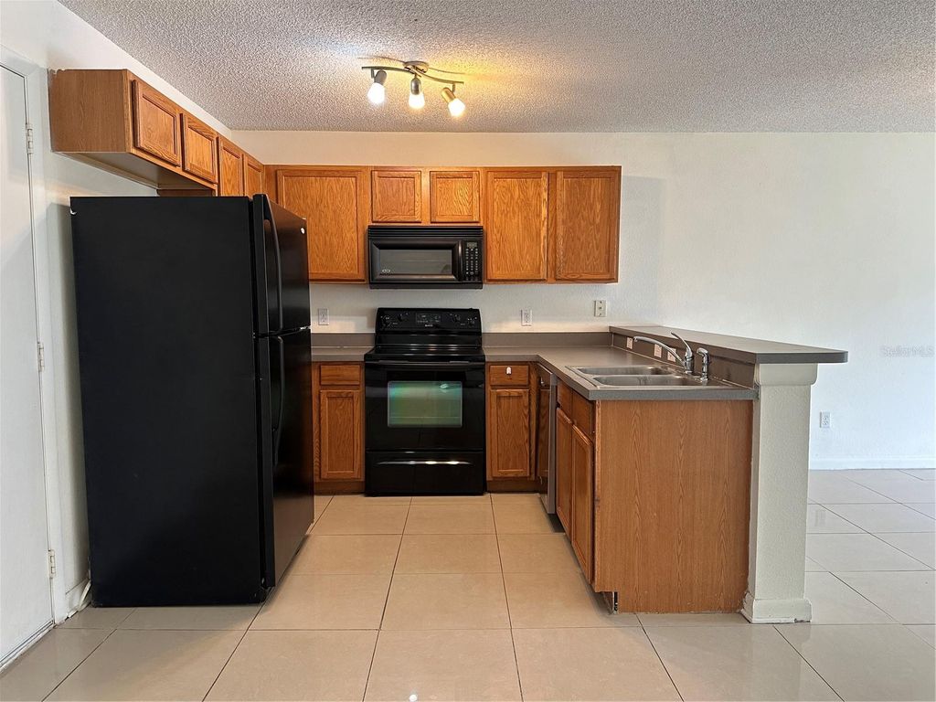 Photo of 12640 Somerset Oaks Street, Orlando, FL 32828 (MLS # O6395956)