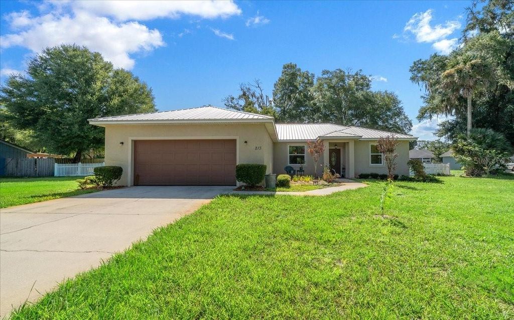 Photo of 213 Grand Avenue, Deland, FL 32720 (MLS # OM728251)