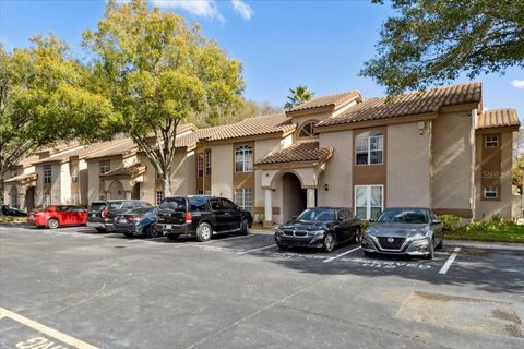 Photo of 4617 Gate Pl #105, Orlando, FL 32811 (MLS # O6382923)