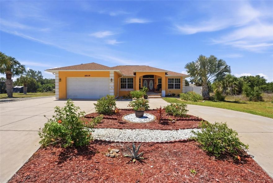 Discover exceptional space, comfort, and flexibility in this beautifully maintained home situated on a rare double lot in Port Charlotte with no HOA fees. Offering 3 bedrooms, 2 bathrooms, and a 2-car garage, this property combines functional indoor living with expansive outdoor possibilities. Featuring tile flooring throughout, soaring vaulted ceilings, and thoughtful upgrades, this home is designed for both everyday comfort and effortless entertaining. With a cleared second lot, ample parking, and room to expand, this property offers endless potential for enjoying the Florida lifestyle.
RESIDENCE OVERVIEW:
• 3 Bedrooms | 2 Bathrooms
• 2-car garage
• Double lot
• No HOA fees
• Split bedroom floor plan
• Screened lanai + heated spa

INTERIOR FEATURES:
• Tile flooring throughout
• High vaulted ceilings
• Spacious living room with built-in gas fireplace
• Glass slider to lanai
• Formal dining room
• Comfortable layout with great flow between living spaces

CULINARY SPACE:
• Eat-in kitchen
• Stainless steel appliances
• Granite countertops
• Breakfast bar for casual dining
• Closet pantry
• Dinette area

PRIVATE OWNER’S RETREAT:
• Spacious primary bedroom with private lanai access via glass slider
• Walk-in closet
• En-suite bathroom featuring:
– Dual sink vanity
– Walk-in shower

GUEST ACCOMMODATIONS:
• Split floor plan for added privacy
• Guest bedrooms with nearby shared bathroom

OUTDOOR LIVING:
• Screened lanai ideal for relaxing or entertaining
• Above-ground 4-person heated spa
• Large fully fenced and landscaped backyard
• Plenty of room to add a pool

ADDITIONAL OUTDOOR FEATURES:
• Cleared second lot for added flexibility
• Storage shed
• Space to park RV, boat, or other recreational vehicles
• Opportunity to expand outdoor living space or backyard

ADDITIONAL FEATURES & UPGRADES:
• 2023 roof with solar panels
• 2023 A/C
• 2021 hot water heater
• Central vacuum system
• Manibloc plumbing system
• Well for irrigation
• Circle driveway with expanded parking area
• Two 30-lb propane tanks fueling fireplace

An outstanding opportunity to own a move-in ready home with extra land, modern upgrades, and unmatched versatility in a convenient Port Charlotte location. Whether you need space for recreational vehicles, future additions, or simply want room to spread out, this property delivers exceptional value and endless possibilities.