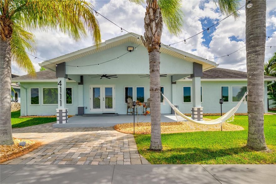 One or more photo(s) has been virtually staged. Completely renovated 3100+ sq ft waterfront ranch in Gulf Harbors Woodlands! This open concept home features a chef's kitchen w/ ice maker, double door refrigerator, soft close wood cabinetry, LED lighting and bonus flex room for office, nursery or gym. Canal-front w/10,000 lb boat lift+45x12 dock for easy Gulf access. Dual-zoned A/C and modern finishes throughout. Community offers pool, private boat ramp and optional Gulf Harbors Beach Club membership with private beach, volleyball, concerts and event rentals. Florida waterfront living at its best!