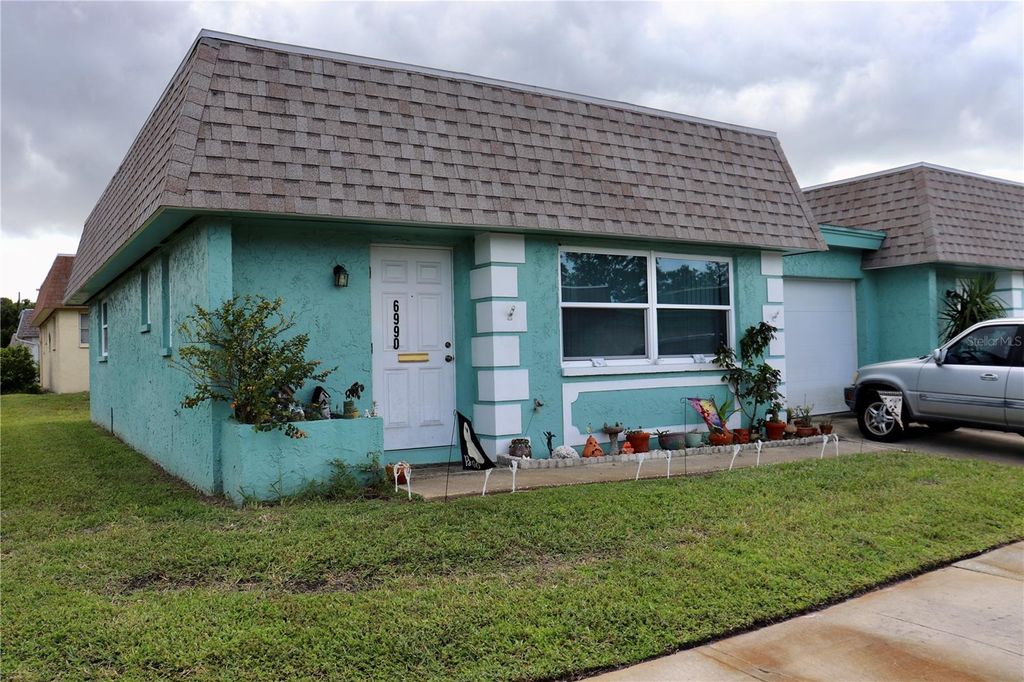 Photo of 6990 Versailles N #6990, Pinellas Park, FL 33781 (MLS # TB8436259)