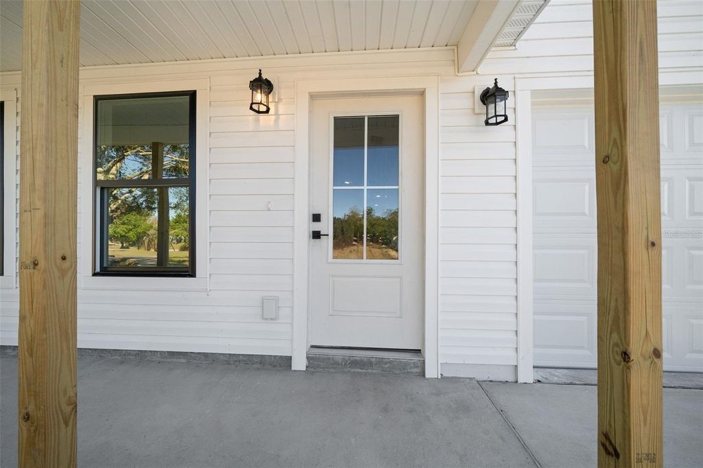 Photo of 8980 Long Lake Avenue, Weeki Wachee, FL 34613 (MLS # W7877315)