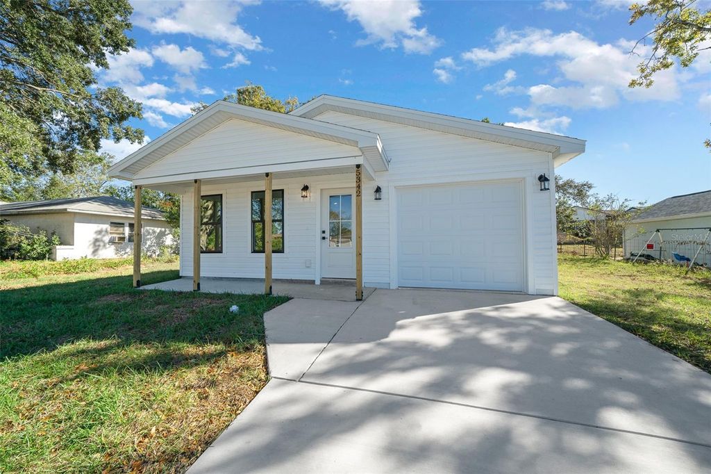 Photo of 8980 Long Lake Avenue, Weeki Wachee, FL 34613 (MLS # W7877315)