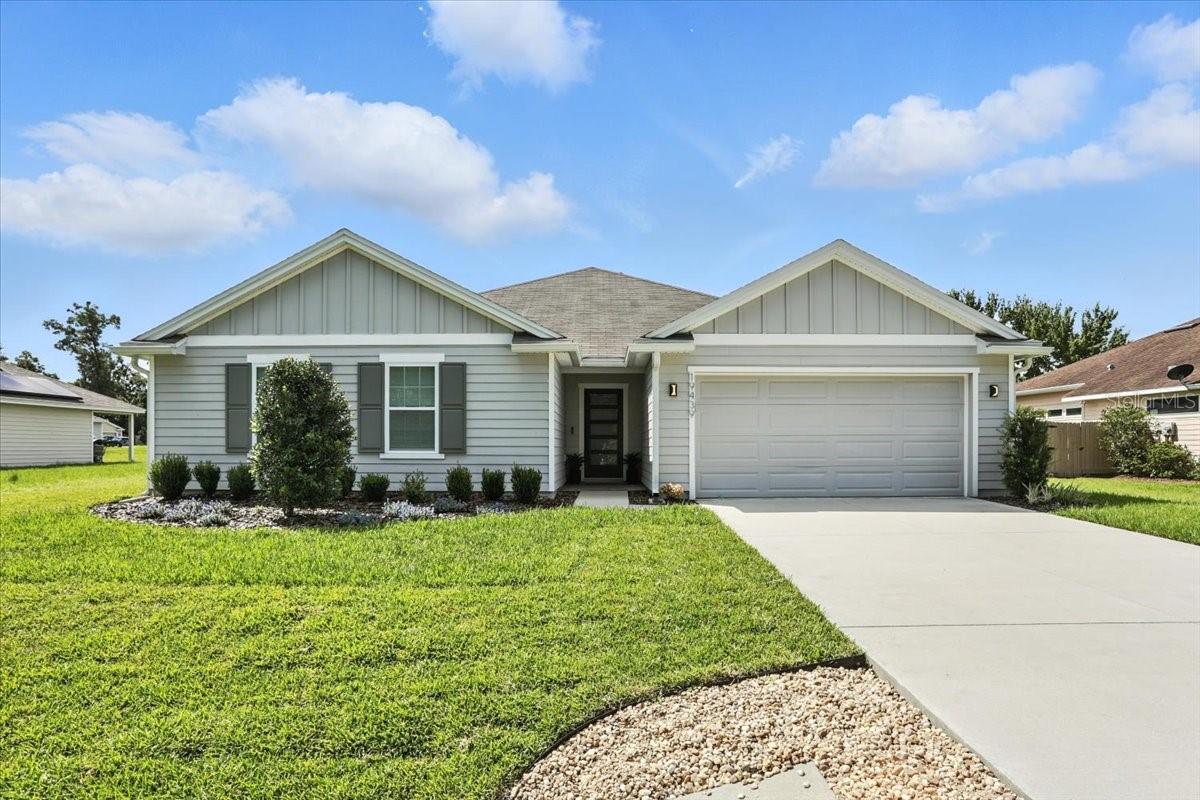Stunning fully remodeled 4BR/2BA home in sought-after High Springs, FL, just minutes from world-renowned freshwater springs, 5 minutes to Alachua, and 15 minutes to Gainesville. Featured in the May 2025 UK Edition of Living Etc. Magazine, this home blends modern luxury and thoughtful craftsmanship. Interior upgrades include luxury vinyl plank flooring, solid wood doors, custom lighting, custom closets, and an all-stone electric fireplace. The kitchen is a designer’s dream, with Bosch induction range, steam convection oven, speed oven/microwave combo, French door refrigerator, ultra-quiet dishwasher, beverage center, new quartz countertops and backsplash, custom double-cylinder all-brass range hood, and a large, enclosed pantry or coffee bar area. The primary suite features drop-down ceiling accent lighting and a spa-like en-suite with custom walk-in shower, featuring Tippeti mosaic tile on the bathroom floors and shower walls, double marble vanity. The primary suite also offers a large custom walk-in closet. Guest bedrooms offer designer accent walls, and the guest bath includes a custom stone vessel sink, extra-deep soaking tub with glass enclosure, and tile flooring. This showcase home is packed with high-end finishes and design features rarely seen at this price point. Move-in ready, one-of-a-kind, and perfectly located to enjoy the charm of High Springs and the convenience of nearby city amenities.