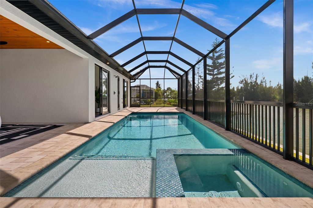 Photo of 10522 Riverside Road, Port Charlotte, FL 33981 (MLS # C7525111)