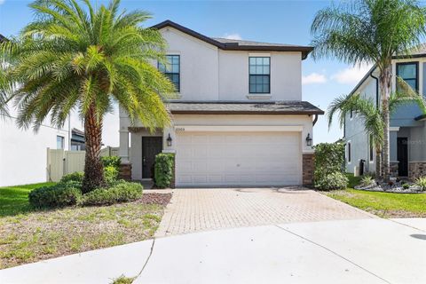 Photo of 10105 Newminster Loop, Sun City Center, FL 33573 (MLS # TB8527216)