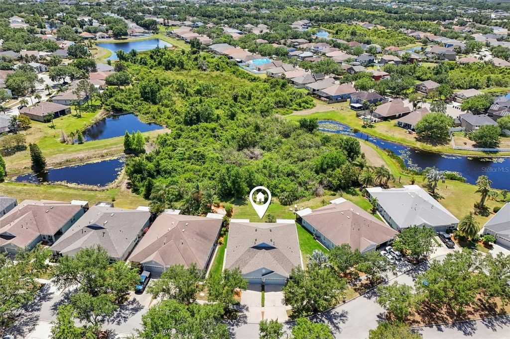 Photo of 7413 Surrey Wood Lane, Apollo Beach, FL 33572 (MLS # TB8374126)
