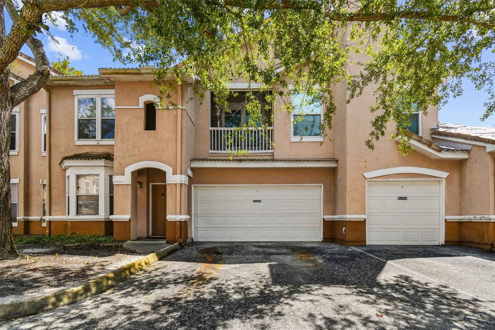 Updated corner unit with 3 bedrooms (split-floor plan), 2 full bathrooms is located at the Villas at Cross Creek. This home features high ceilings with an abundance of natural light. The unit is surrounded by mature landscaping providing a lovely, green privacy and offers a covered balcony overlooking the pond. Upon entry, you are greeted by an open floor plan with the great room encompassing a lovely living/dining room combination. BRAND-NEW WINDOWS (Energy-star rated, low-e) that reduce your utility bills. Ceramic tile floors in the foyer, kitchen & bathroom areas, and rich-looking engineered wood in the halls and main living areas. Brand new plush carpets in all bedrooms. Kitchen has polished/sealed granite countertop, newly installed double sink with Moen faucet, a great pantry/storage closet in kitchen. Adjacent to the living room there’s a dining nook in a bay area surrounded by windows. Enjoy gathering and entertaining at the breakfast bar or bring your morning coffee outside to enjoy on the covered balcony overlooking the pond. The three spacious bedrooms are separated by a main hallway that includes a built-in work desk area with shelving, spacious laundry room, and abundant closet space throughout the home! The master suite offers a king-sized room featuring a huge walk-in closet sure to please anyone! It has an en-suite bathroom with new vanity topped with Carrara marble, new faucets, toilet, new exhaust fan and shower hardware. HOA fees include internet plus gives you cable, entitling you to three boxes for cable access, and includes sewer and trash. The Villa Creek Community is built around a central pond, surrounded by conservation, offering many desirable amenities: community pool, fitness center, and fenced playground.