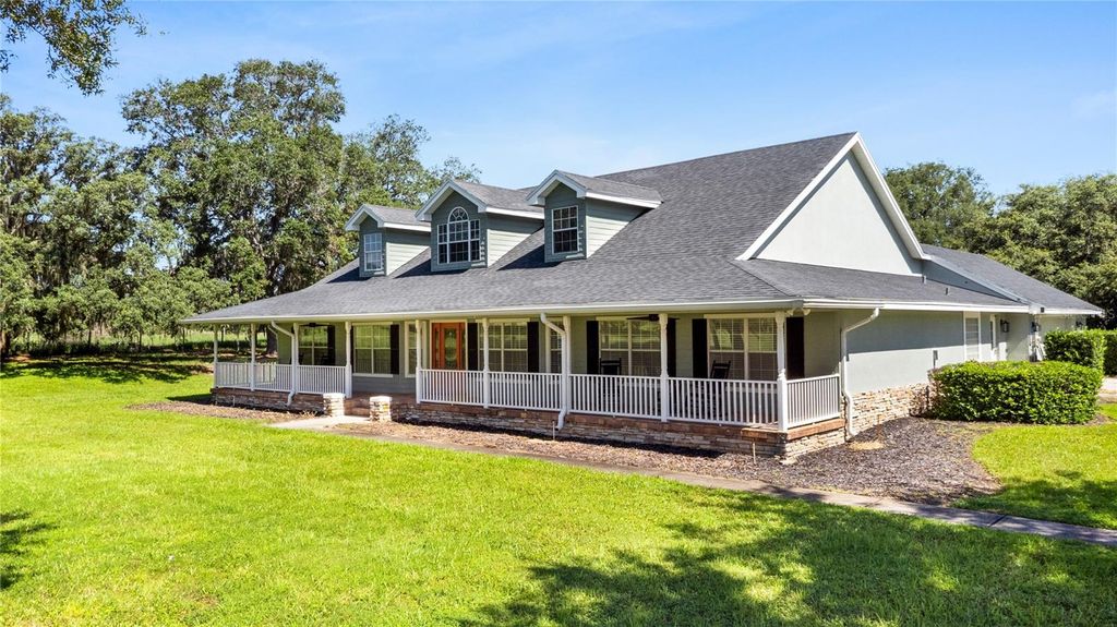 Photo of 9045 Lake Hatchineha Rd, Haines City, FL 33844 (MLS # L4963039)