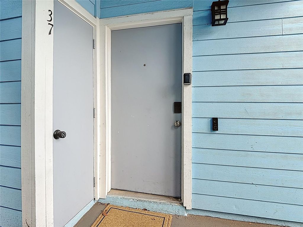 Photo of 2753 N Poinciana Boulevard #37, Kissimmee, FL 34746 (MLS # OM723580)