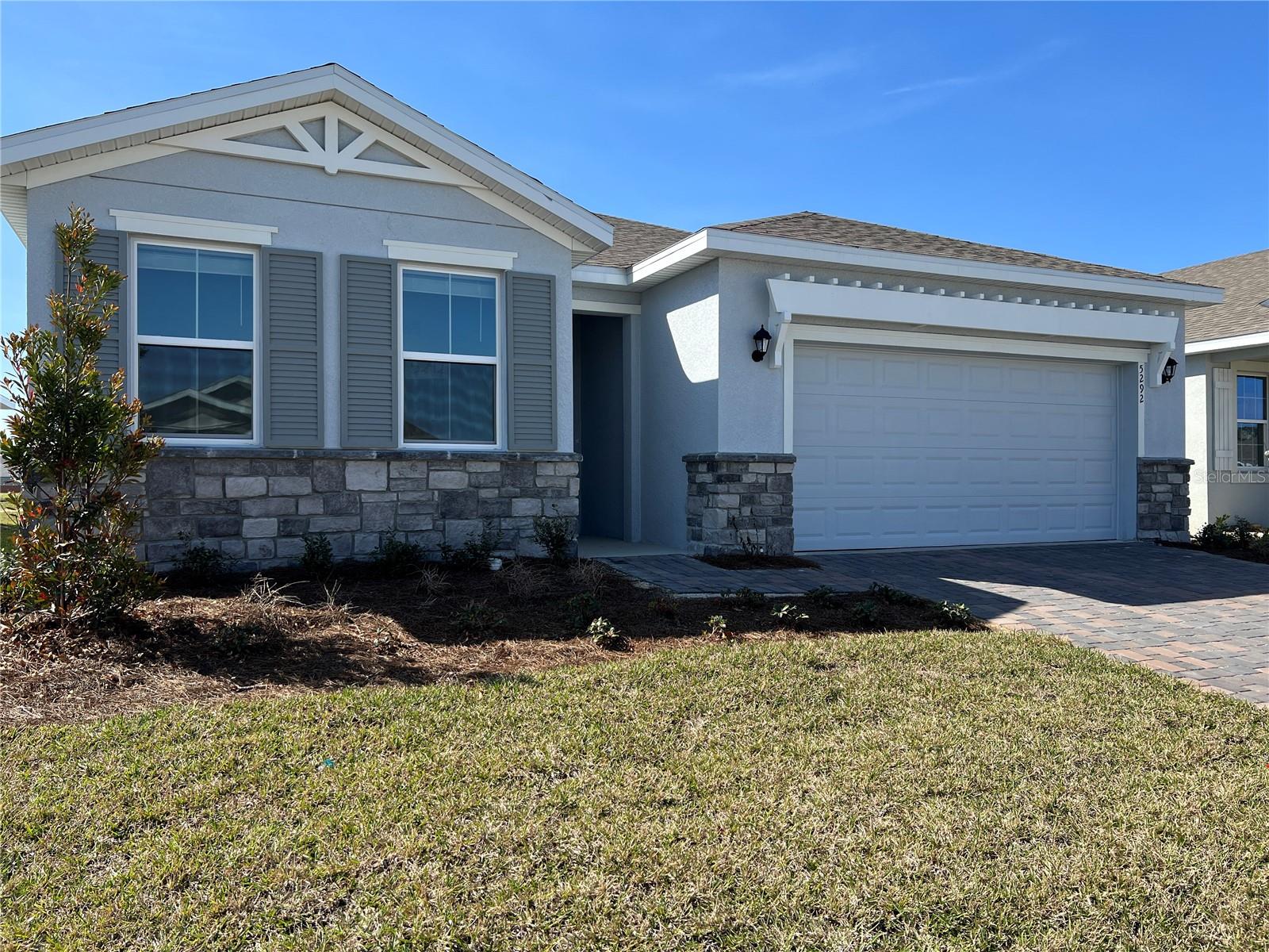 Beautiful 4/2/2 home in the Family Section of Ocala Preserve. Resort style living for the entire family, located just minutes to the World Equestrian Center, restaurants, and shopping. This one-story home has open concept kitchen, stainless steel appliances, large covered lanai, 4 bedrooms, master is en-suite with oversized shower, and a two car garage. Enjoy everything Ocala Preserve has to offer which includes 7-acre lake for kayaking and fishing, expansive network of walking and hiking trails, resort style pool and lap pool, resort clubs, golf course, and tennis courts. Memberships are available to access the Ocala Preserve Country Club, lease includes association dues except one-time optional membership fee to the Ocala Club. Lawn care, landscaping and bulk internet is included. Don’t miss out on this one and start enjoying your family time at the Ocala Preserve.