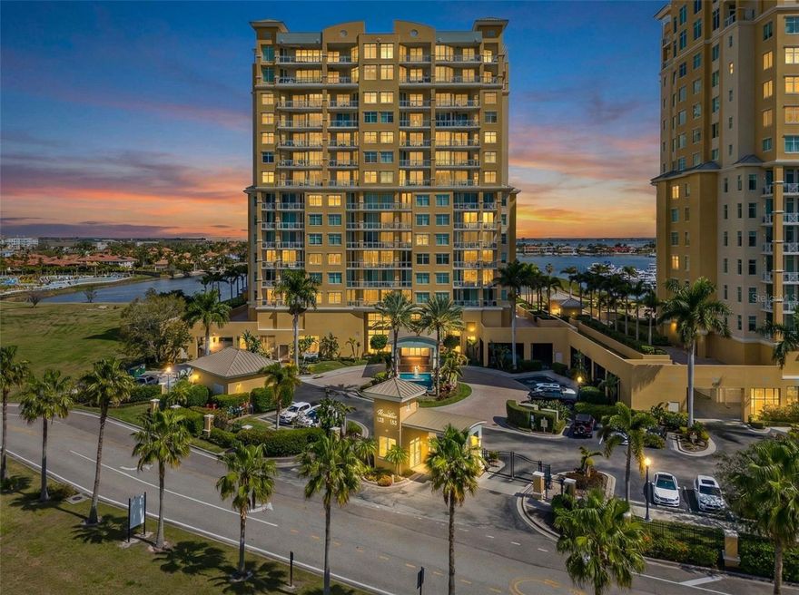 Experience refined coastal living from the fifth floor of this exceptional east facing waterfront residence in Palmetto. Accessed by a private elevator that opens directly into the residence, this luxury condominium offers 1987 square feet, featuring two large bedrooms and baths, 10 foot ceilings, and 8 foot solid core doors throughout-architectural details that create an open and airy ambiance rarely found in condominium living. Perfectly positioned on the east side of the building, this residence captures breathtaking sunrise views over the water, filling the home with morning light while offering cooler, shaded afternoons-ideal for comfortable year-round living. The open-concept design provides ample living and dining spaces that feel both elegant and inviting. The primary suite offers a spacious retreat with a well appointed en suite bath, while the second oversize bedroom provides flexibility for guests or a refined home office. Enhance your culinary skills in a chef's kitchen, appointed with premium Wolf appliances including a speed oven, convection oven and induction cooktop. Residents of this gated, resort-style community, enjoy an outstanding collection of amenities including, two resort-style pools, a dedicated lap pool, six pickleball courts, state-of-the-art fitness center, two private movie theaters, two billiard rooms, two social rooms for events and entertaining, two  hobby/project rooms. Boating enthusiasts will appreciate the adjacent marina with boat slips available for purchase. Ownership also includes exclusive access to the adjacent Marriott Beach Club, which offers large resort style pool, cabanas, volleyball, nine-hole putting green, and more. This condominium offers easy access to the world-class beaches, the downtown districts of Sarasota, St. Petersburg, Bradenton and Tampa-as well as their international airports-making travel, dining, entertainment, and the arts easily within reach. Whether you're looking for a full-time residence, seasonal retreat, or investment opportunity, this condominium delivers the ultimate Florida lifestyle. Waterfront, resort-style coastal living doesn't get better than this! Updates include HVAC, water heater, appliances. Upgrades include blinds, built ins, pantry, crown molding, laminate floors. Also, ownership includes a climate controlled storage cubicle(96" x 74") and two parking spots including one deeded parking space under building.