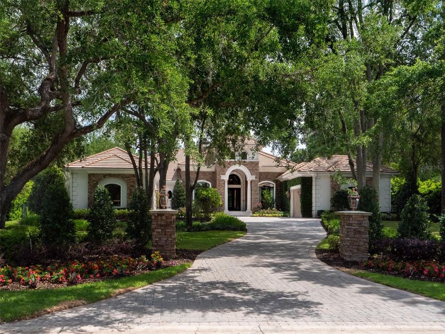 If you are seeking a luxury home that is better than "new construction", with unparalleled finishes, set on one of the most private lots with mature landscaping, and is move in ready, then look no further. This fabulous property recently underwent an extensive two year renovation, bringing it to a high level of sophistication and artful design, that is extremely rare to find, including new construction! It is located on the 18th Fairway in the Masters Section of Golden Ocala Golf & Country Club. Jump on your golf cart, and motor next door to the World Equestrian Center to experience world class horse shows as well fine dining, pub fare, and a variety of other year-round entertainment and events! The owners spared no expense in the transformation of this home, and was planned in great detail by award winning designers and the finest craftsmen. Through the double doors is a grand entrance to the living room with a full wall of windows for an unobscured view of the waterfall, pool, and meticulous landscaping & fairway in the distance. The private primary suite is spacious & layered in luxury with the finest fixtures and finishings. There are also three additional en-suite guest bedrooms designed to the same level of sophistication. The handsome chef's kitchen features high end appliances & fixtures, a double island, rich wood cabinetry, built-in ovens, two dishwashers, built-in coffee machine, wine fridge, stand-alone built-in ice machine, and a large pantry. Adjoining the kitchen is a warm and comfortable family room; two walls of retracting glass doors open fully to the pool and outdoor living area. You will feel as if you just landed in a tropical paradise at a five-star resort; the landscaping, mature trees & hedges provide beauty, ambience, and a level of extreme privacy on a very spacious lot. Words can only modestly describe the beauty and tasteful grandeur of this fantastic move-in ready Golden Ocala home.