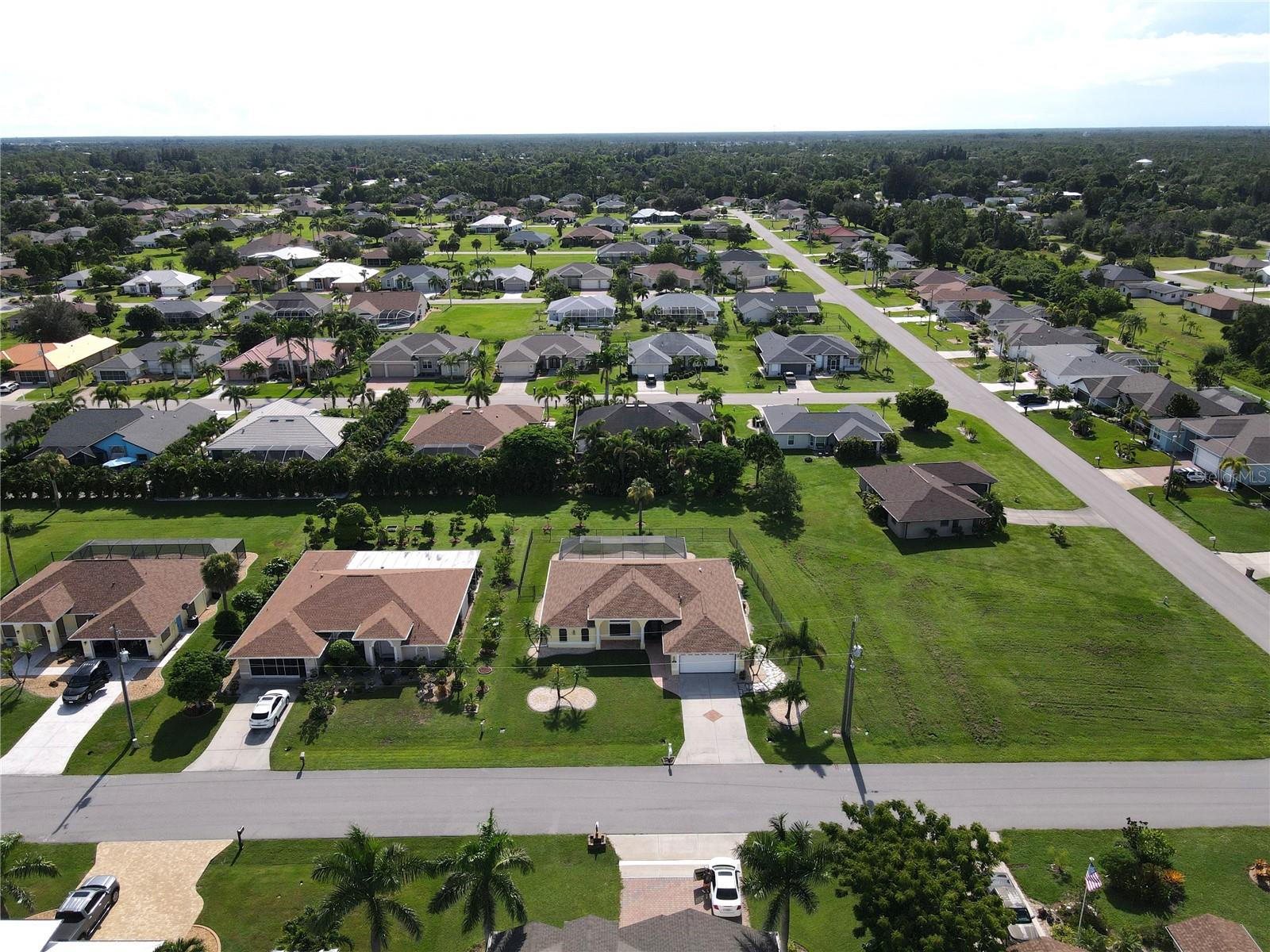 Under contract-accepting backup offers. Welcome to beautiful Punta Gorda and the Burnt Store Meadows Subdivision. This home is a 1998 sq. ft. 3 bedroom and 2.5 bath home that has a large lanai and a pool that measures in at approx. 23 x 11 and this home is not in a flood zone! The home is clean as can be and ready to move in immediately. We can close in as little as 2 weeks for those of you that need it. The backyard is fenced in and borders a nice size green belt that offers even more privacy than most neighborhoods enjoy. The corner lot right next door is also available at an additional $49,900, so imagine the possibilities of owning both. Once inside, you will appreciate the vaulted ceiling and open floor plan. The living room has a triple pocket slider door that opens up to the pool and lanai area that makes it feel like an extension of the living room. All 3 bedrooms are very nice sizes and the primary bedroom has a his and her walk in closet combination along with a bathroom that has a his and her sink set up. This room also has access to the lanai and pool area through a set of french doors. Tile floors are installed throughout the entire home so maintenance is very easy. The covered part of the lanai measures in at 26 x 8 so there is plenty enough room for grilling and relaxing. The roof was replaced in 2022 and just recently real river rock was installed all around the house in the flower beds. Gutters and downspouts are installed all around the perimeter of the home as well. The air conditioner was replaced in 2019. Location of this home is key as a Walmart, Home Depot and Publix Shopping Center are just minutes away for the utmost convenience. Downtown Punta Gorda is just 10 minutes away with all the wonderful dining options and different types of cuisines. So much history to explore as you walk around town and enjoy the miles long walking and biking path. Pickleball has become the rave here and the new pickleplex has leagues and tournaments weekly. For all you golfing enthusiast, there is 8 different golf courses all within a 20 minute drive. Sit at the point and enjoy the Harborside water views or go to the park downtown on the water and watch the little ones have fun while watching a spectacular sunset. Enjoy the Saturday morning Farmers Market which is always a fan favorite. The Christmas Tree lighting is a huge event each Christmas time. Halloween downtown is just unbelievable so you will need to come down and see it for yourself. The primary bedroom outfit is free for the buyer or we can remove it if the buyer does not want it. All appliances stay with the home. So hurry now to set up your viewing of the home.