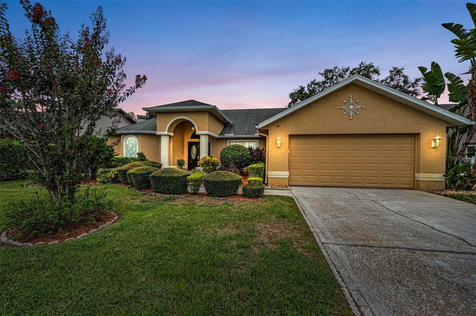 Where can you find a peaceful backyard oasis with a WATER VIEW that is NOT in a flood zone? You’ve found it! Welcome to Whispering Lakes, a sought-after community surrounded by spring-fed lakes situated next to the Brooker Creek Preserve. Step into the grand entrance that sets the tone for this remarkable POOL home on an OVERSIZED LOT. Upon entry, you will find double front doors with artistic leaded glass open to vaulted ceilings and bright living spaces with pool and water views. This 3-bedroom, 2-bathroom waterfront home featuring newer stainless steel appliances offers a screened lanai with pool and pavers, perfect for outdoor living. The backyard provides seclusion and privacy, featuring a spacious deck - perfect for grilling and entertaining while overlooking the tranquil water. This home is complete with a desirable split floor plan and neutral colors with newer tile flooring. There is an inside laundry room for everyday ease. The second bathroom offers direct access to the lanai, providing added convenience for outdoor living and entertaining. In addition, the canal-fed irrigation system allows you to water your lawn without added expense! Whispering Lakes spans 60 acres, has a community park, pickleball, basketball, and tennis courts. The LOW HOA fee adds to the appeal, and the home is zoned for some of Pinellas County’s TOP-RATED SCHOOLS. Enjoy nearby outdoor recreation with hiking, birding, and equestrian trails at Brooker Creek Preserve, or take a short 23-mile drive to the award-winning Clearwater Beach. Tampa International Airport is just 20 miles away, with shopping, dining, and numerous local parks close by. Nestled in a hidden enclave of unique homes, this property presents a rare opportunity to live on the water without flood insurance and outside of a flood zone - a true gem that combines charm, exclusivity, and peace of mind.
