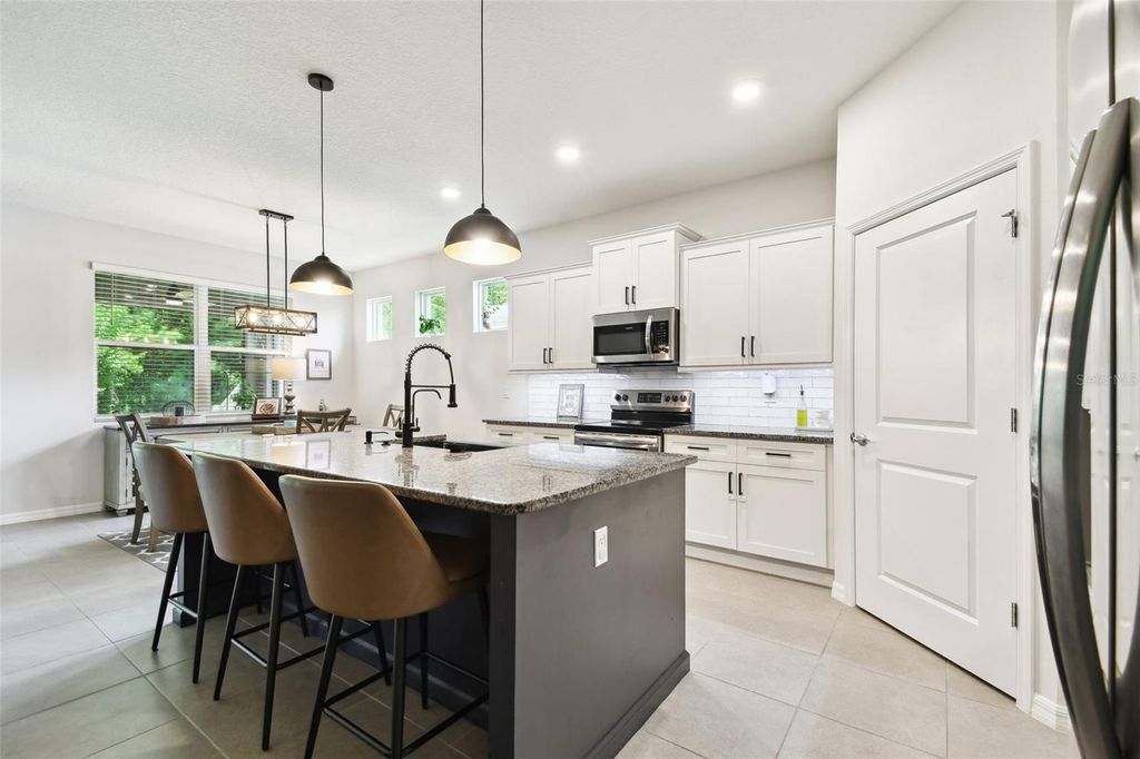 Photo of 32825 Sand Creek Drive, Wesley Chapel, FL 33543 (MLS # TB8390563)