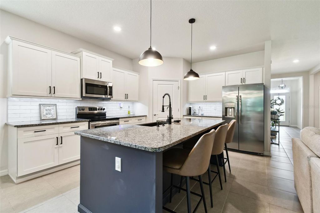 Photo of 32825 Sand Creek Drive, Wesley Chapel, FL 33543 (MLS # TB8390563)