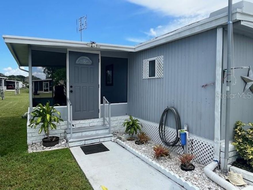 Looking for a move-in-ready 14 foot single wide? Then you need to make an appointment to see inside this home. Features a 2-bedroom split plan, 2 baths of which 1 has been updated with walk-in shower. New Laminate floors throughout, Screen enclosed side entry Porch. Bonus room off the Living room.Brand New Electric Panel Upgrade.The Kitchen has an eating area. Utility shed housing your Washer/Dryer. This home is situated in a very active 55+ community with year-round- heated Pool. Low monthly HOA fee of $143 a month which includes lawn maintenance and trash removal, Clubhouse, Shuffleboard, Pool, Ground maintenance, etc. Sold As Is. Buyer to verify all information that is deemed to be accurate. Measurements are approx. Ideal for someone who is looking for a quiet retreat or an affordable winter getaway, this home is nestled in a community where tranquility and sunshine abound. With no rental options available, you can be assured that your neighborhood will remain peaceful and private, perfect for long term relaxation. Make the most of the Florida warmth and lifestyle today-your new home awaits!! Just around the corner from shopping and restaurants...set you appointment today to see this gem.