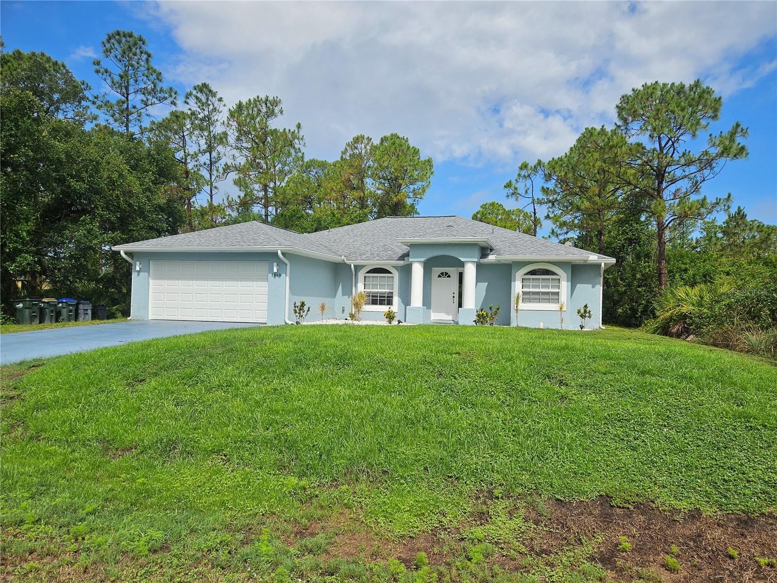 Great home with open floor plan in quiet neighborhood. New Roof in May 2024. Freshly painted inside and out. New high-end vinyl flooring throughout. Oversized master bedroom with large walk-in closet and an en-suite bathroom. True split plan with high ceilings, natural light and space. Bonus room for your home office. Ample closet and storage space. Separate laundry room with utility sink leading to the 2-car garage. Large screened in porch and private backyard. Recently serviced propane operated generator that kicks in if the power goes out.