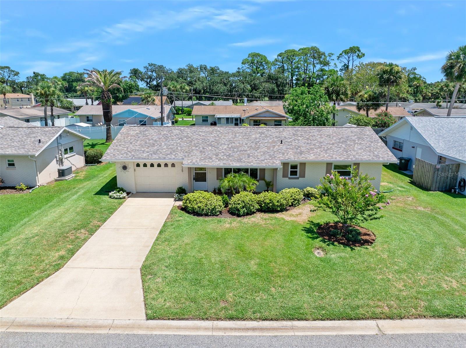 Move right into this beautifully updated ranch-style home located in an established neighborhood. Featuring 2 bedrooms, 2 baths, and a bright, open layout with wood-look porcelain tile throughout, This home is packed with modern upgrades. Enjoy a new roof (2025) accented with gutters, renovated kitchen with quartz countertops, real wood shaker cabinets with soft-close (2025) and updated appliances (2023). Also included are new double hung windows and sliding patio door (2025) and fresh exterior paint (2023). This cute home also has 2 full bathrooms that have been updated with quartz countertops, new pipes, sinks, faucets, toilets, light fixtures and all closet doors were updated throughout the home. The HVAC was replaced in 2018. There is a fully fenced yard with new well pump (2023). The Washer/Dryer (2021) combo complete the package. Ideal for anyone looking for a truly move-in ready oasis!