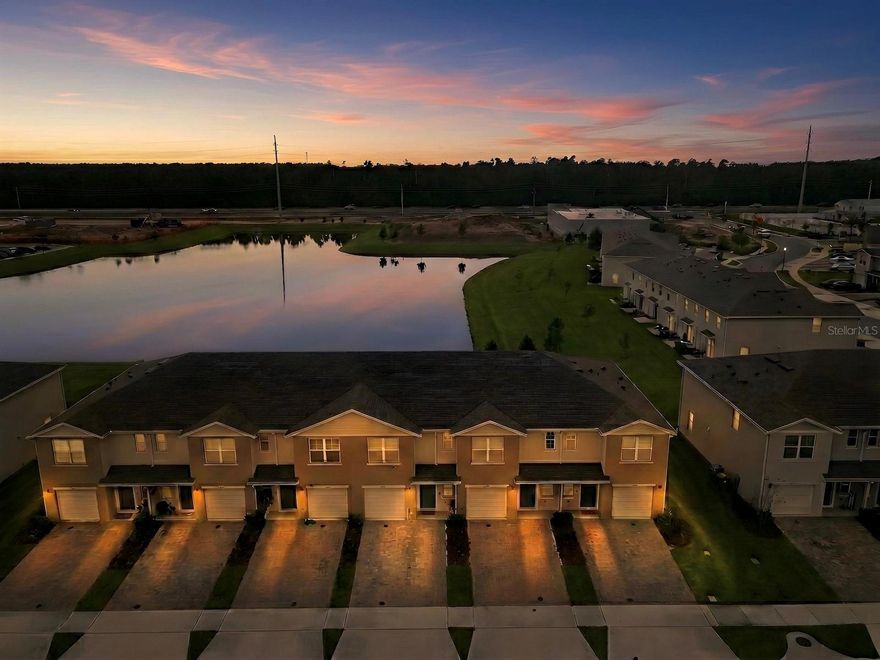 Welcome to this beautiful modern townhome located in the highly desirable Harmony West community in St. Cloud, Florida. Built in 2024, this well-designed residence offers approximately 1,463 square feet of comfortable living space, featuring 3 spacious bedrooms, 2.5 bathrooms, and a functional open-concept layout perfect for today’s lifestyle. As you enter the home, you are welcomed by a bright and inviting foyer leading into the main living area where the kitchen, dining, and living room flow seamlessly together, creating the ideal space for both everyday living and entertaining. The modern kitchen features ample cabinet space, generous counter space, a center island with bar seating, and stainless-steel appliances, making it perfect for preparing meals or gathering with family and friends. The first floor also includes a convenient powder bathroom and access to the patio, offering a relaxing outdoor space ideal for morning coffee or evening gatherings. Upstairs, the home features a thoughtfully designed layout with three spacious bedrooms, including a comfortable primary suite with private bathroom, along with additional bedrooms perfect for family members, guests, or a home office. A landing area and additional storage space provide extra functionality for everyday living. Located in the master-planned Harmony West community, residents enjoy access to resort-style amenities including a community pool, clubhouse, fitness center, splash pad, playgrounds, and walking and biking trails designed for an active and social lifestyle. The community is conveniently situated just minutes from Lake Nona Medical City, major highways, shopping, dining, and Orlando International Airport, offering the perfect balance between peaceful suburban living and easy access to Central Florida’s top destinations. Whether you're a first-time homebuyer, investor, or looking for a low-maintenance lifestyle, this beautiful townhome offers modern construction, smart design, and an exceptional community setting.