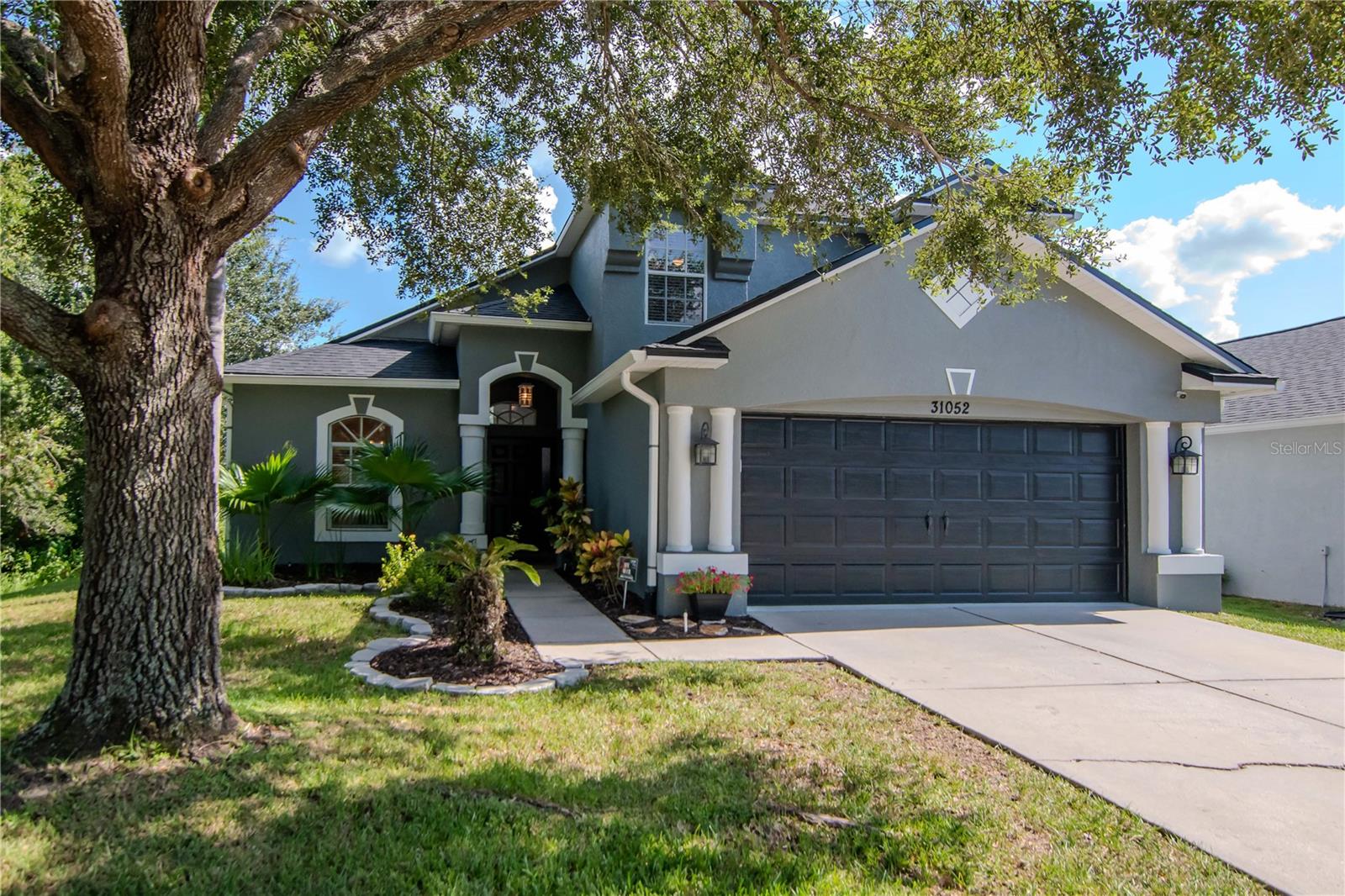 This beautiful 3-bedroom, 2.5-bathroom home is tucked inside a desirable gated community in Wesley Chapel and comes with the peace of mind of a brand-new roof (2025).
As you step inside, you’ll be greeted by an abundance of natural light, soaring vaulted ceilings, and a spacious layout designed for both comfort and function. The primary suite and laundry room are conveniently located on the first floor, while the newly installed plank tile flooring adds modern style and durability throughout the main living areas.
The home offers a seamless flow with a great room, dining room, and eat-in kitchen that make entertaining a breeze. The kitchen is equipped with newer stainless-steel appliances and plenty of counter space for meal prep. Just off the kitchen, step outside to your own private retreat—a covered and extended lanai overlooking the fully fenced backyard with three gates, a pond view, and no rear neighbors.
Upstairs, you’ll find two generously sized bedrooms, each featuring a charming window seat perfect for reading or relaxing. A spacious loft area provides additional flexible living space, ideal for a playroom, office, or media room.
Thoughtful touches like custom window treatments and decorative wood awnings add warmth and character, blending beautifully with the home’s light fixtures and overall design. Recent updates include a 2019 AC system and a 2018 water heater, ensuring efficiency and comfort.
With only one neighboring home and a peaceful conservation area on the other side, you’ll enjoy both privacy and serenity.
The amenities that are included are amazing Meadowpointe offers a club house with newly updated pool, playground, volleyball court, basketball court, tennis courts, and too much to mention. This move-in-ready home is conveniently located near everything Wesley Chapel has to offer—top-rated schools, hospitals, shopping, dining, interstates, and more.
All that’s left to do is move in and start enjoying the lifestyle you’ve been waiting for! Sellers are also offering $5k towards buyers closing costs, prepaids or interest rate buydown.
