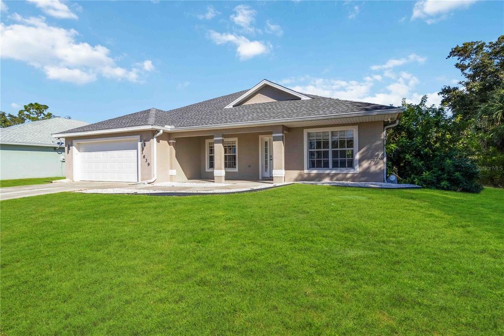 Photo of 1639 Lace Terrace, Port Charlotte, FL 33953 (MLS # A4668492)