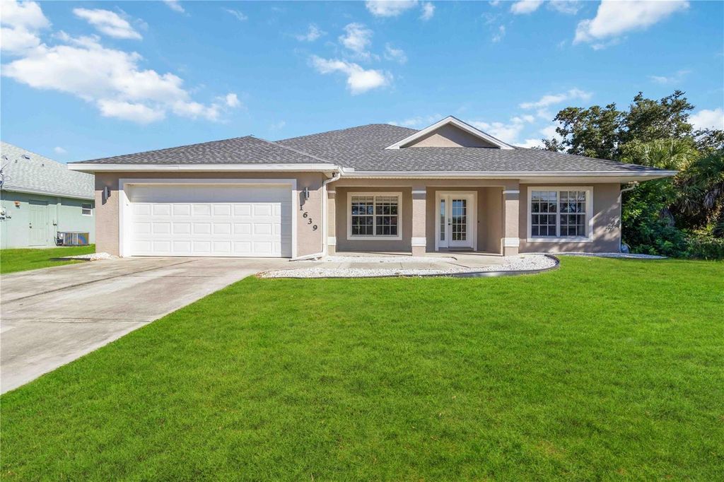 Photo of 1639 Lace Terrace, Port Charlotte, FL 33953 (MLS # A4668492)