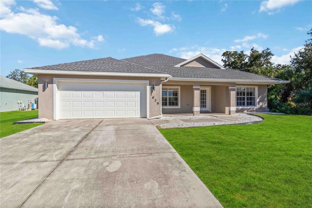 Photo of 1639 Lace Terrace, Port Charlotte, FL 33953 (MLS # A4668492)