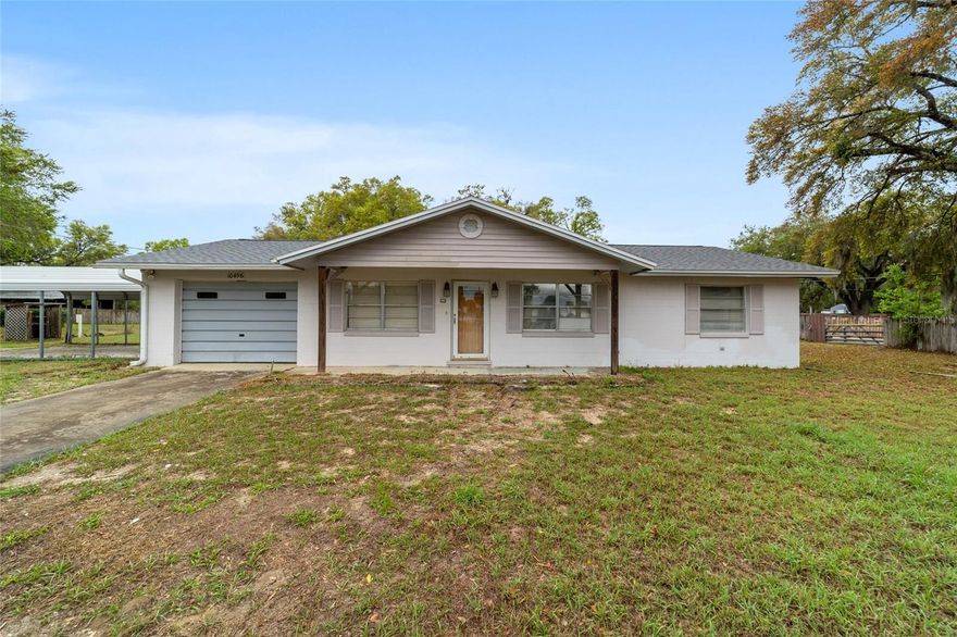 Great opportunity to make a home what you need! BRAND NEW ROOF on this 3 bed 2 bath with 20 x 12 enclosed back porch. There are 3 OUTBUILDINGS all with NEW ROOFS!! Workshop, garage space, covered parking for all your toys? This property has it all, even a glimpse of the water of Sunset Harbor from the front porch. Inside each bedroom has newer carpeting and built in closets. The living room is spacious and has plenty of light. Kitchen offers ample counter space & cabinets and is convenient to the dining area with french doors to the back porch. There is a 1 car garage with washer/dryer hookup. Take a look, this one might go quickly!