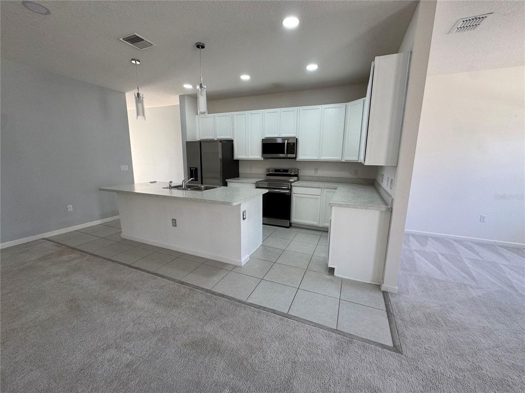 Photo of 269 Bella Prestwick Boulevard, Davenport, FL 33837 (MLS # S5144434)