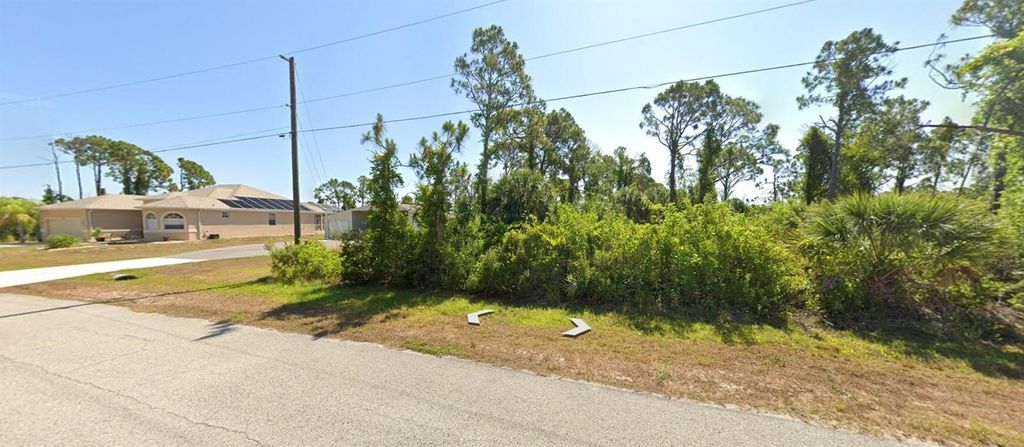 Photo of 8448 Matecumbe Road, Port Charlotte, FL 33981 (MLS # O6416338)