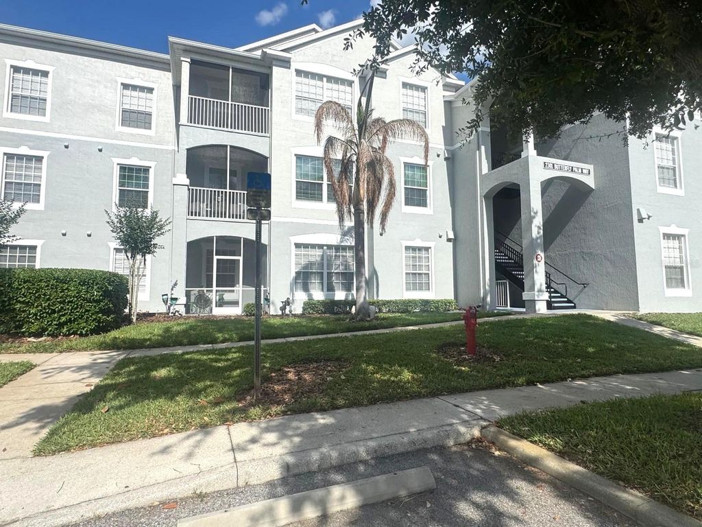 Photo of 2301 Butterfly Palm Way #101, Kissimmee, FL 34747 (MLS # O6403426)