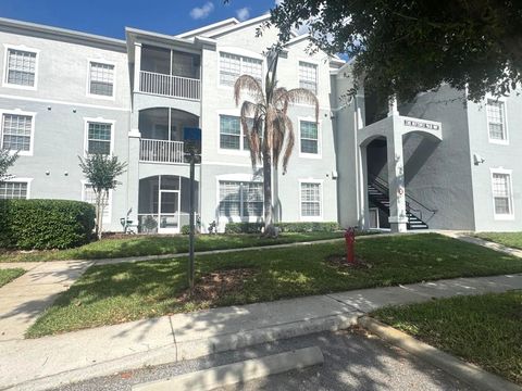 Photo of 2301 Butterfly Palm Way #101, Kissimmee, FL 34747 (MLS # O6403426)