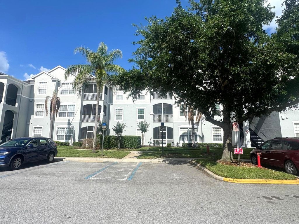 Photo of 2301 Butterfly Palm Way #101, Kissimmee, FL 34747 (MLS # O6403426)