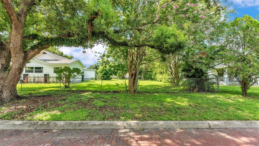 Beautiful buildable lot in the extremely sought after Historic District of Lakeland.  This has public utilities available and has the added benefit of frontage on the main street but also rear access from the alley way, allowing for lots of options such as rear or detached garages.  This property is cleared and ready to build on with mature trees in place providing beautiful landscaping accents for your new build. This is the perfect site for a new single family home build.  This lot is also extra deep so you will have a nice backyard.  There are not many lots left in the historic district, especially at this price point and ready to build on!!!