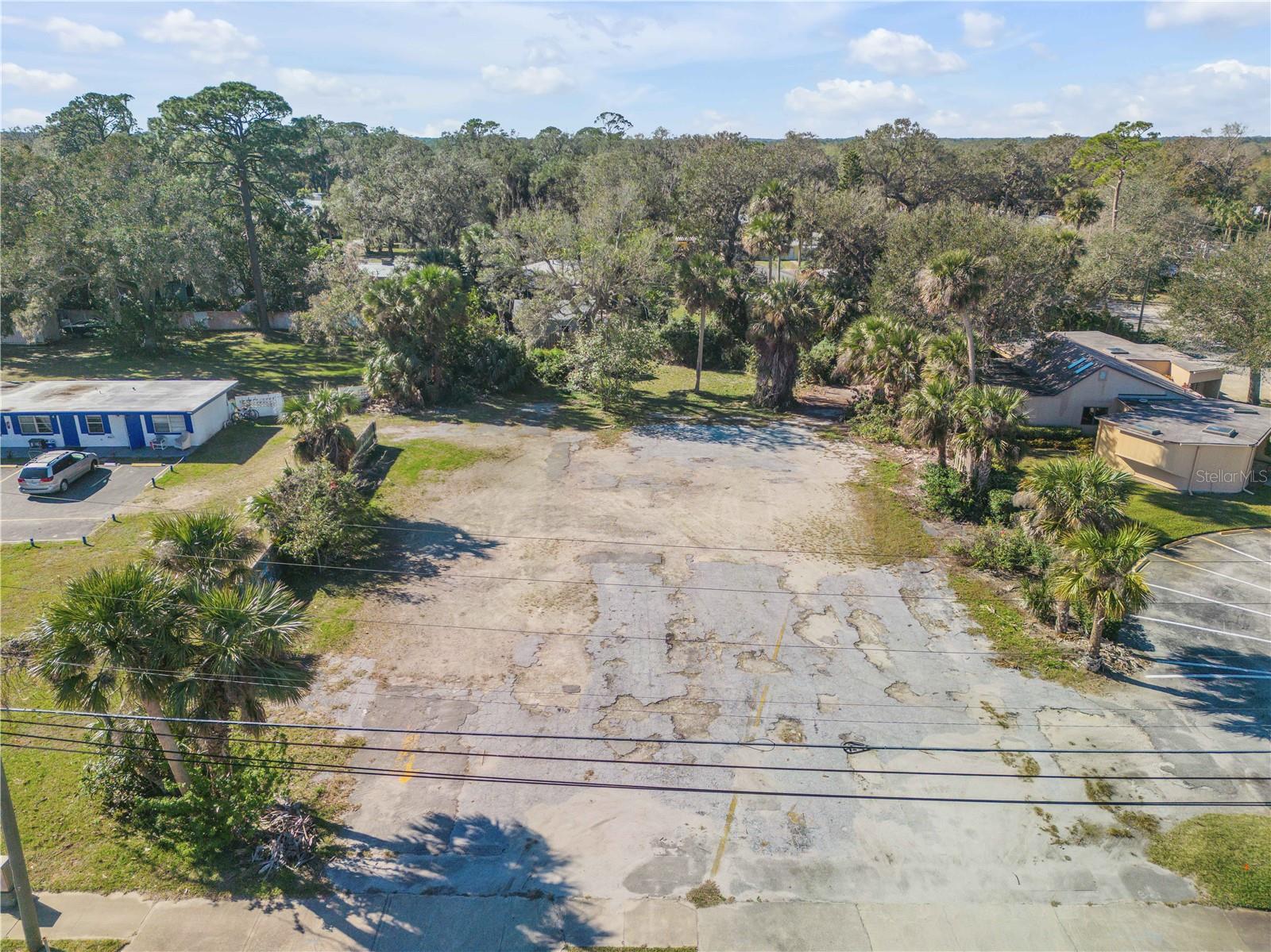 COMMERCIAL VACANT LEVEL LOT, ZONED B-3 IN HIGH VISIBLE AREA WITH DIRECT ACCESS TO N. DIXIE FREEWAY IN BEAUTIFUL NSB FL. LOT IS 108.5' WIDE X 200' DEEP (21.700 SF) OR 1/2 ACRE IN TOTAL AREA. THIS PRIME LOCATION IS CLOSE TO THE AIRPORT HAS 2 EXISTING CONCRETE APPROACHES OFFERING E-Z INGRESS & EGRESS TO HIGHWAY. WATER,SEWER & POWER ARE AVAILABLE TO THE LOT WITH A 3K CREDIT FROM NSB UTILITIES, TO BE APPLIED TOWARDS RECONNECTING SERVICES. THIS WAS THE SITE OF A PRIOR CAR WASH THAT WAS DEMOLISHED IN 2007 WHICH QUALIFIES THE LOT FOR MANY ECONOMIC DEVELOPMENT & REDEVELOPMENT INITIATIVES FROM THE CITY, PROVIDING MANY INCENTIVES INCLUDING MATCHING GRANT MONEY FROM $100,000 TO AS MUCH AS $250,000. CALL FOR ADDITIONAL INFORMATION ON THIS GREAT OPPORTUNITY!